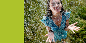 Woman standing in rain